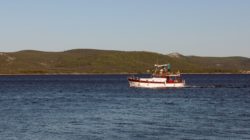 Small Boat At Sea