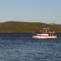 Small Boat At Sea