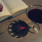 Wine, book and rose