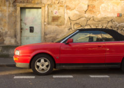 Red Car Cabrio With Grunge Wall