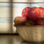 Red Apples In A Wicker Basket