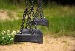 Empty Swing On Playground