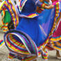 A dancers in a colorful dress