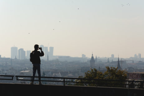 Man shooting cityscape