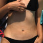 Detail of woman body in black bikini