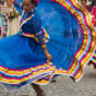 Dancing woman in traditional mexican dress
