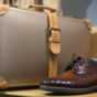 Men’s leather boots and suitcase