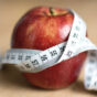 Diet Concept – Red Apple And Tape Measure