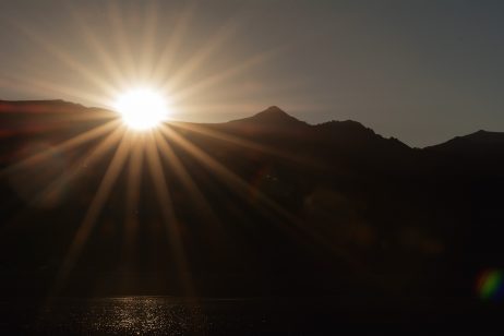 Sunset Sun Rays Over Mountains